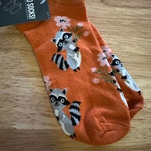Orange Socks with Raccoon Design